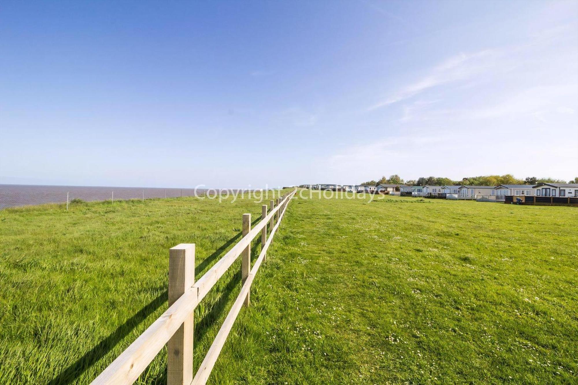 Stunning Caravan With Decking And Free Wi-fi At Broadland Sands Ref 20074bs Campsite