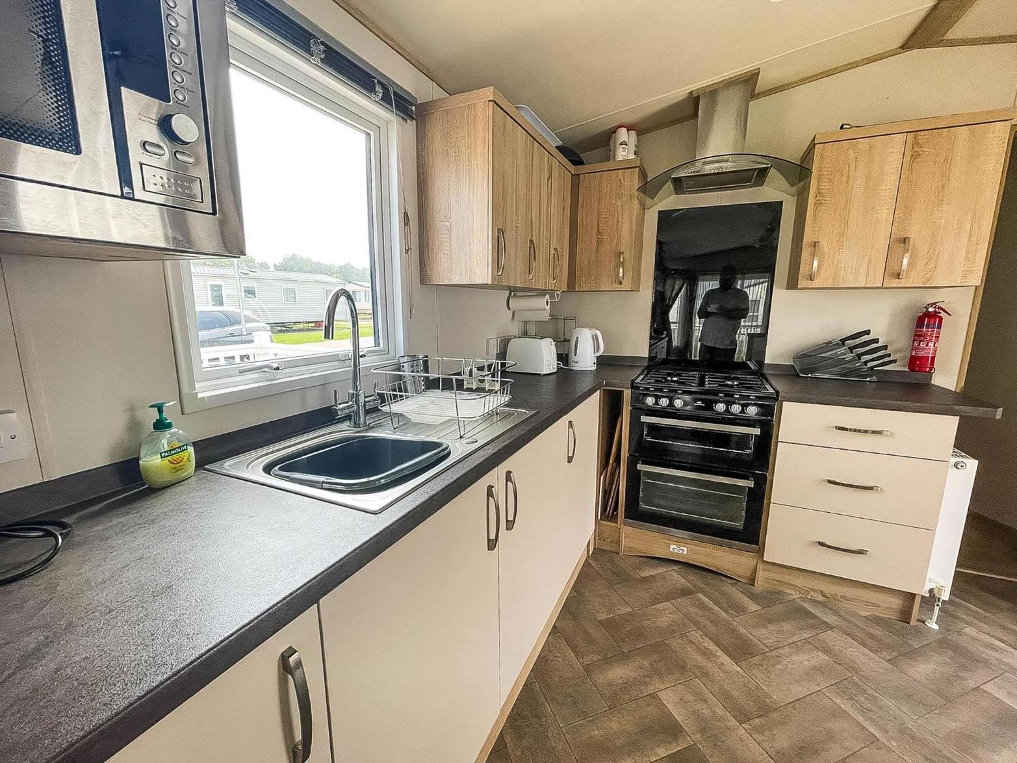 Stunning Caravan With Decking And Free Wi-fi At Broadland Sands Ref 20074bs